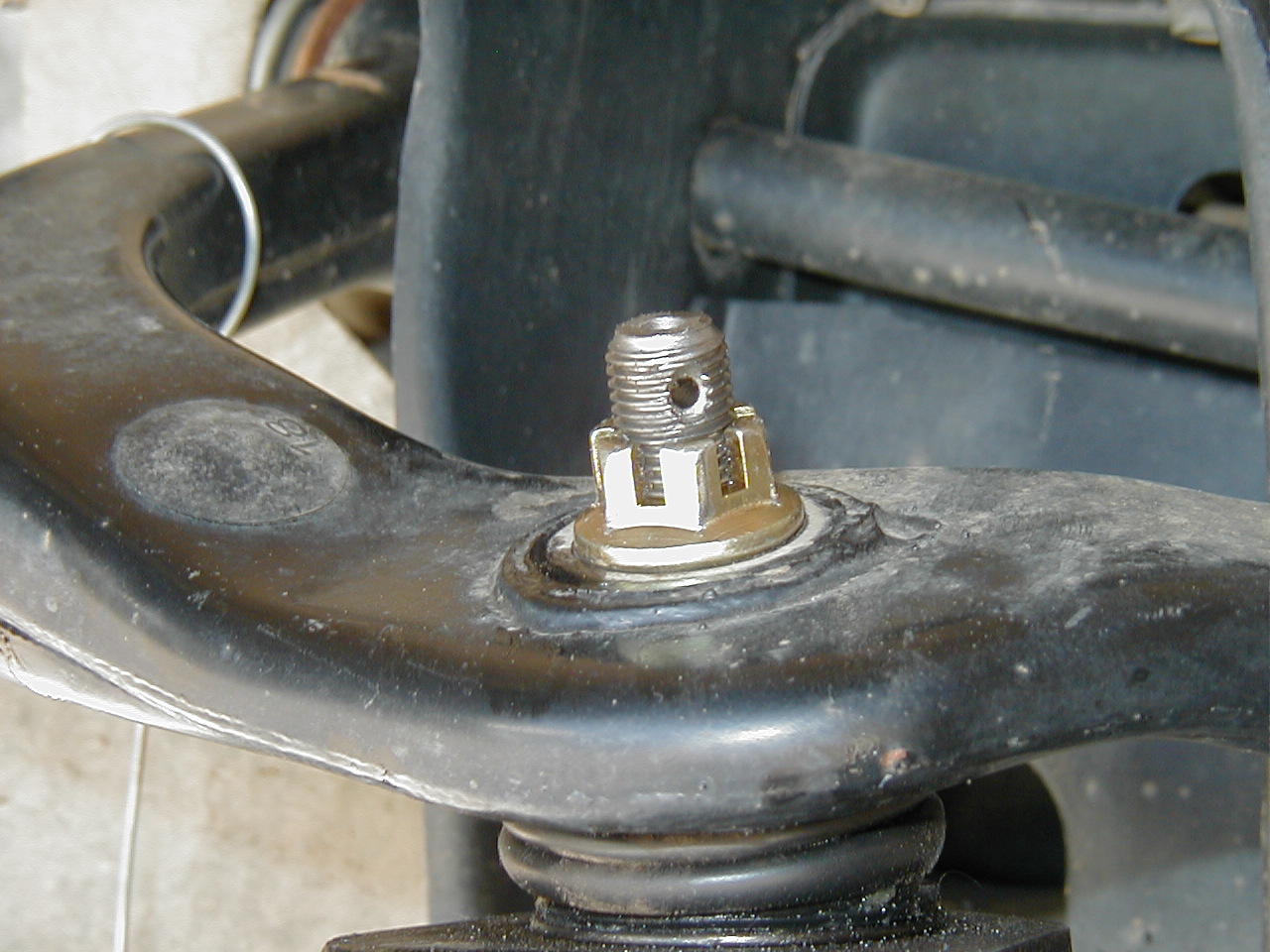 drivers side upper ball joint nut 1